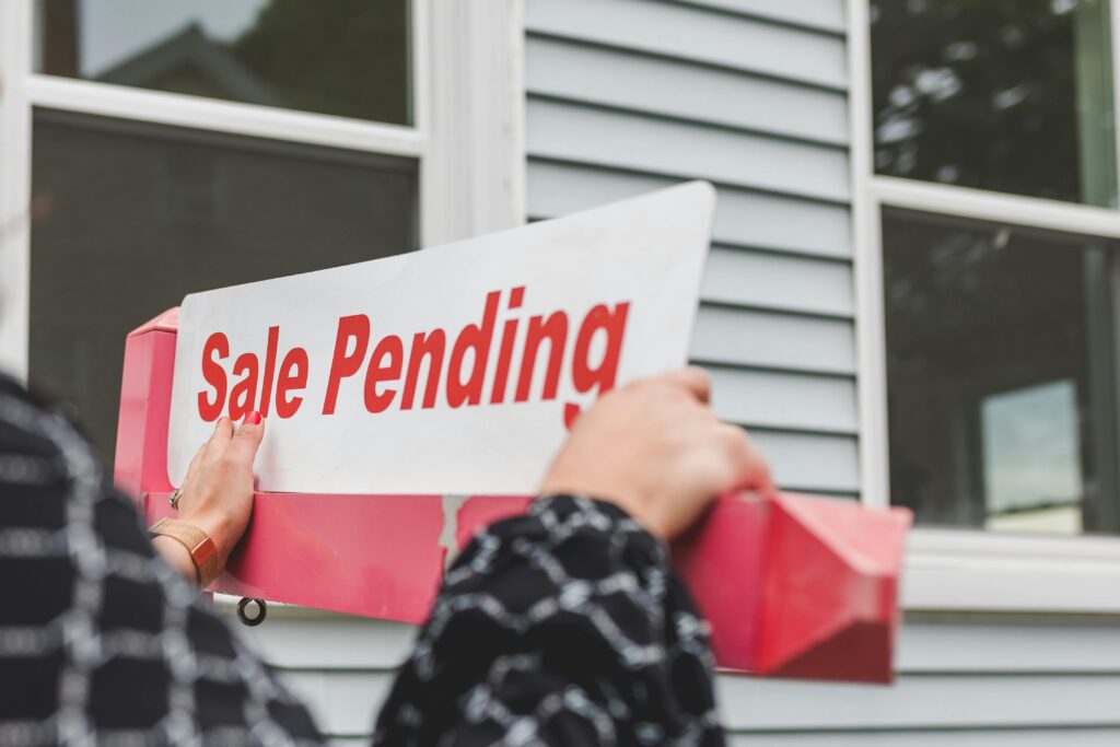 Real Estate Sign that says Sale Pending
