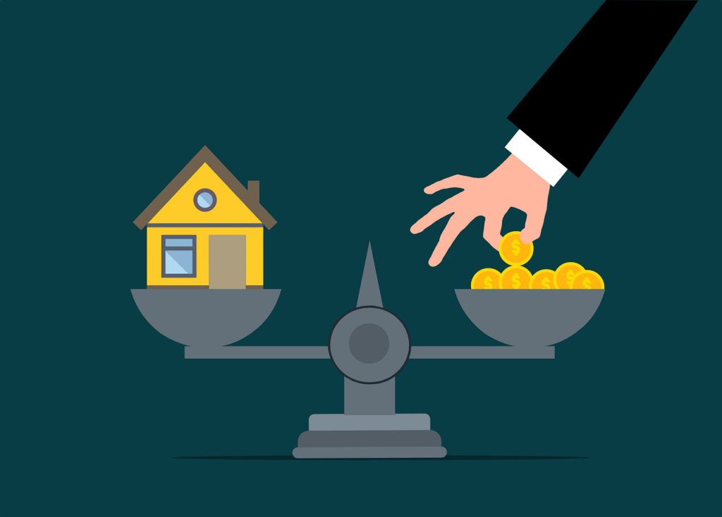 House and cash on scale