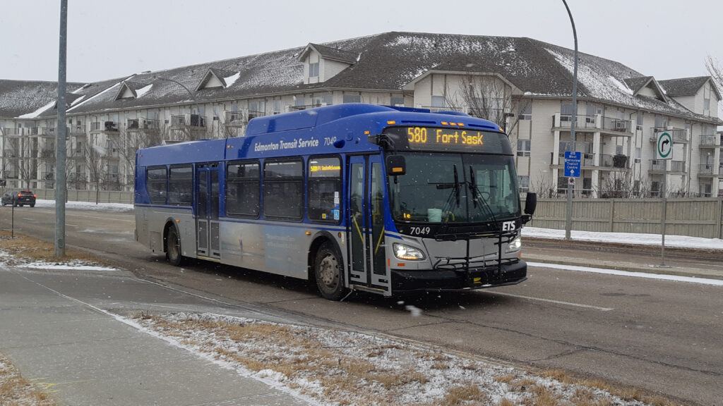 Bus Driving by Apartment in Fort Saskatchewan